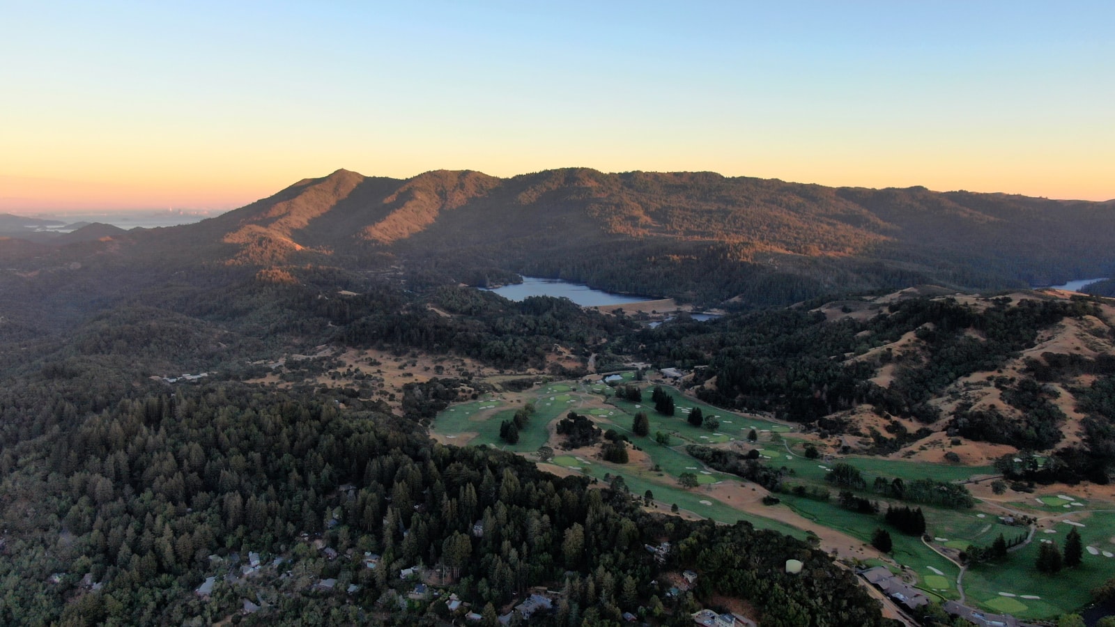 Mountain golf course at golden hour